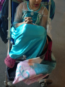 My 'special' Elsa in her buggy.